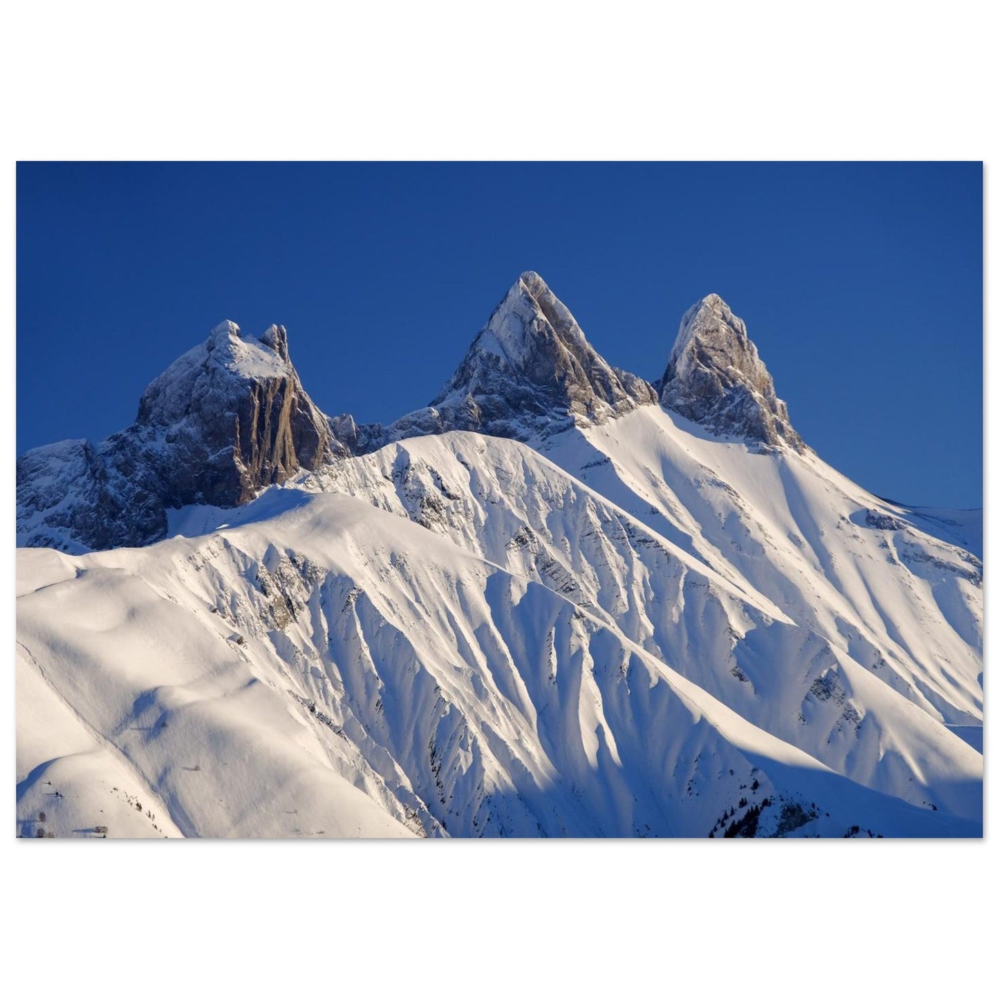 Photo of the snow-covered Aiguilles d'Arves in winter — photo print on matte aluminium Dibond