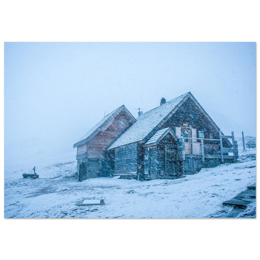 Tableau photo de refuge sous une tempête de neige pour ambiance chalet cocon